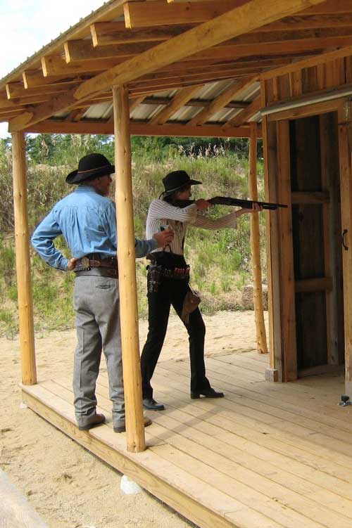 Shooting shotgun through the door.