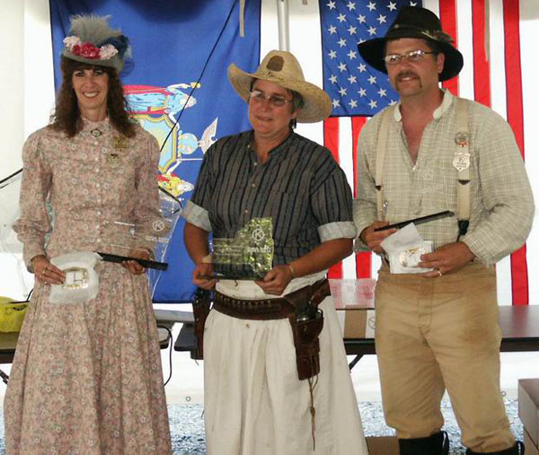 Annabelle Bransford (L) and Vermin Hunter (R) - SASS NY State Champions with Top Gun Half-A-Hand Henri (Center).